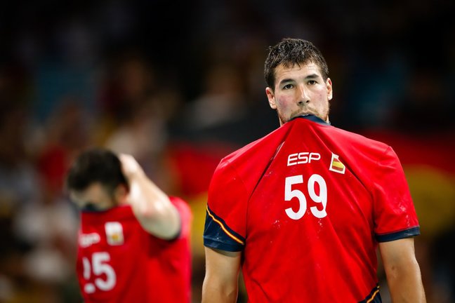 Los jugadores de balonmano en el partido de los juegos olimpicos.